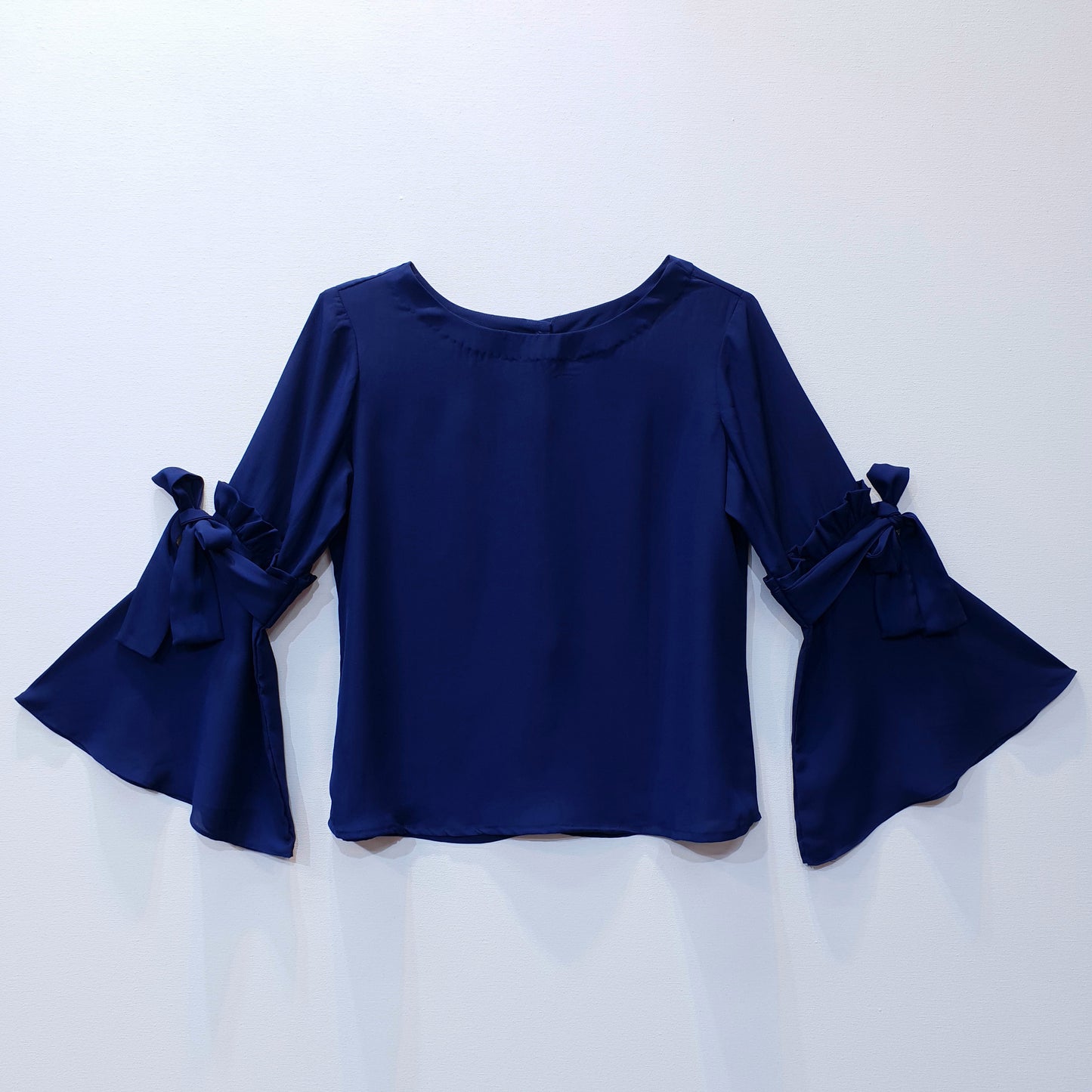 Top with Ruffle Sleeves and Bow Detail