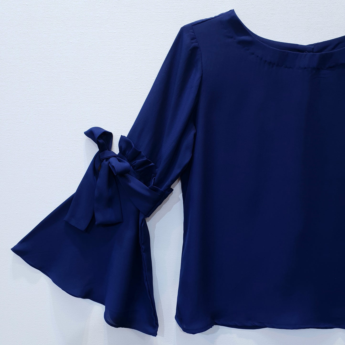 Top with Ruffle Sleeves and Bow Detail